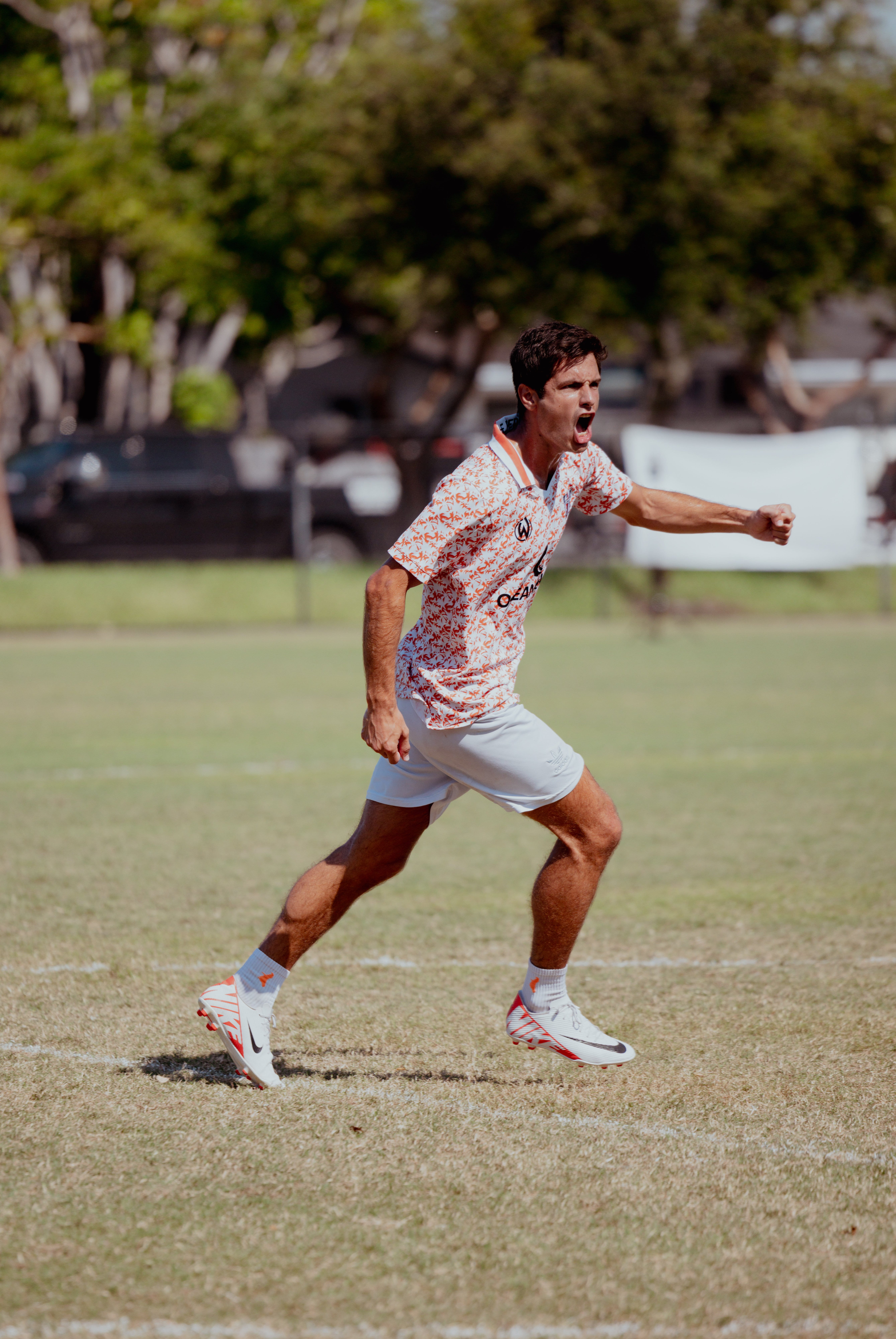 Gol Gala player celebrating on natural grass